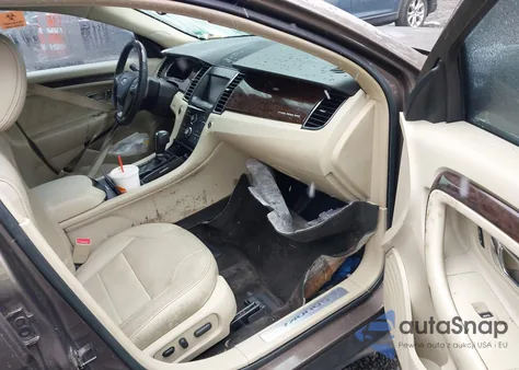 2015 Ford Taurus Limited z USA, uszkodzony, nr VIN 1FAHP2F89FG165526